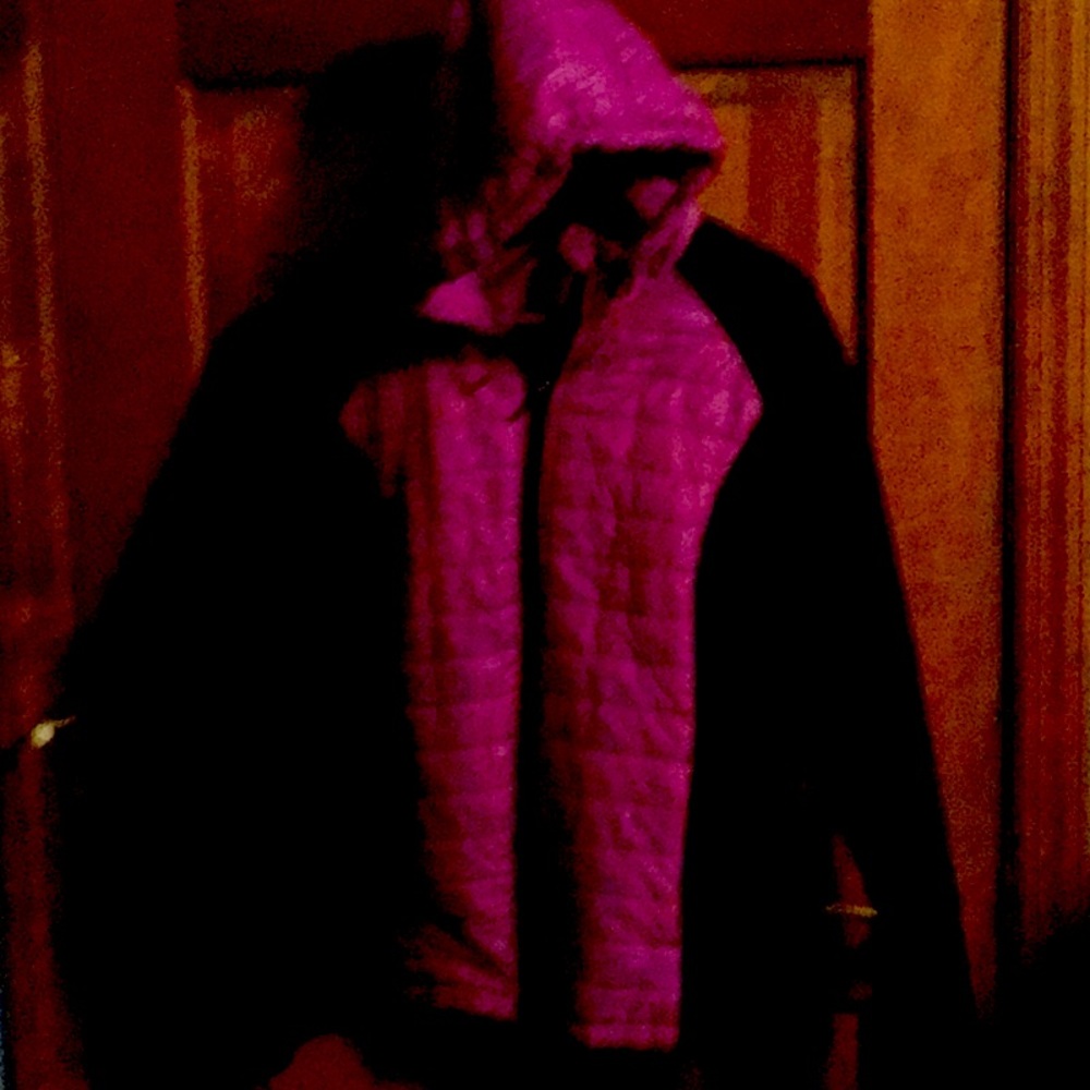 XL size jacket.  Purple with black sleeves and sides.   No tears or rips.